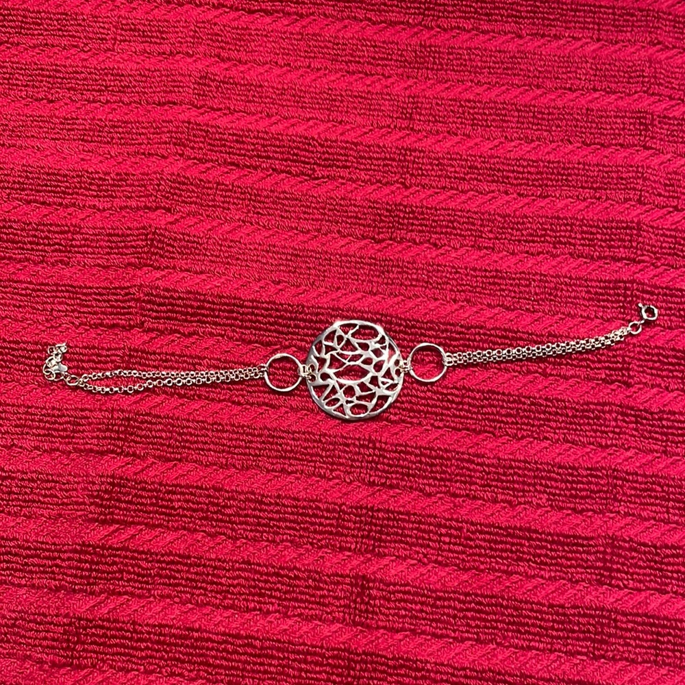 Silver bracelet.